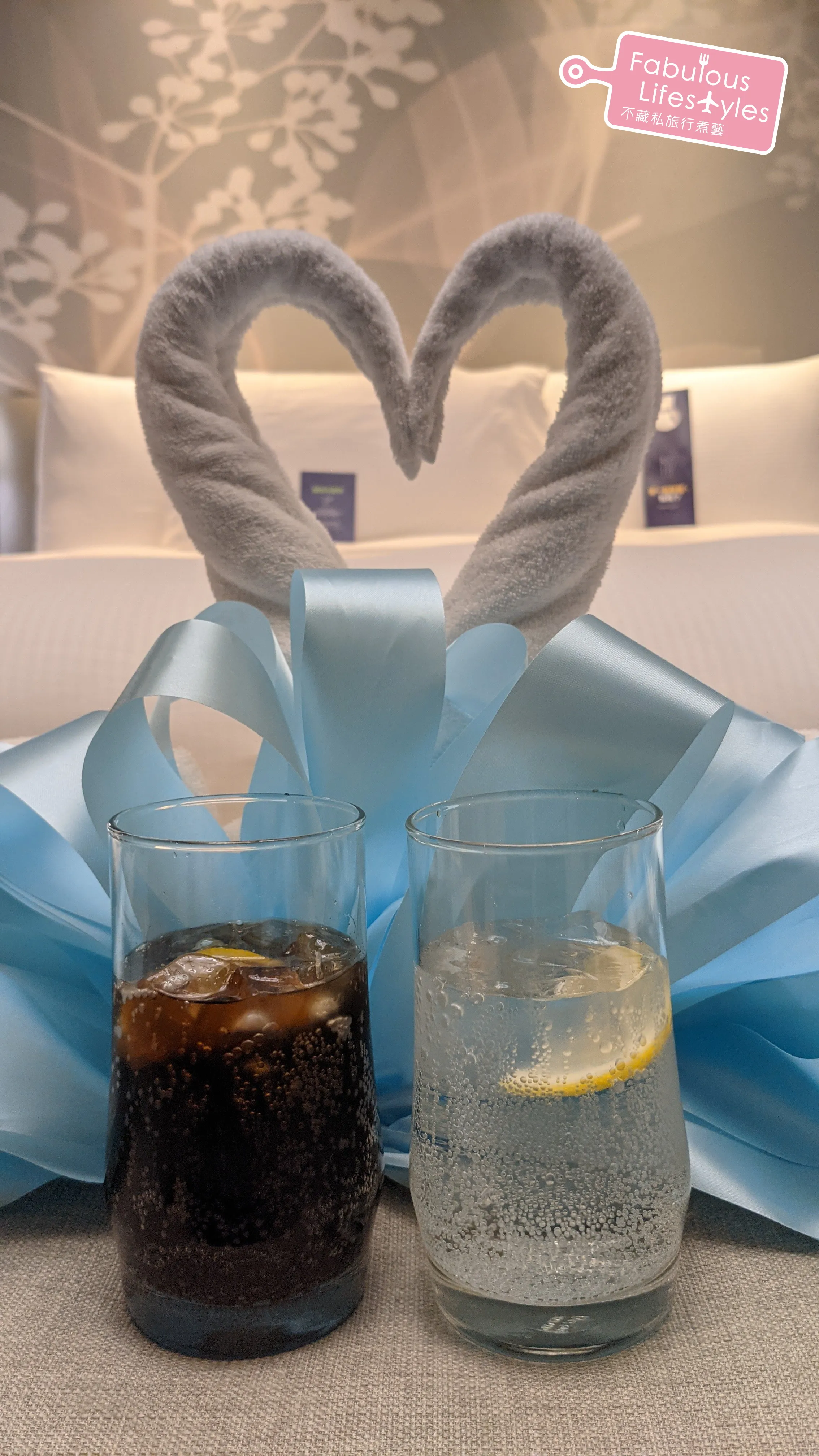 Offering the towel swans a cocktail