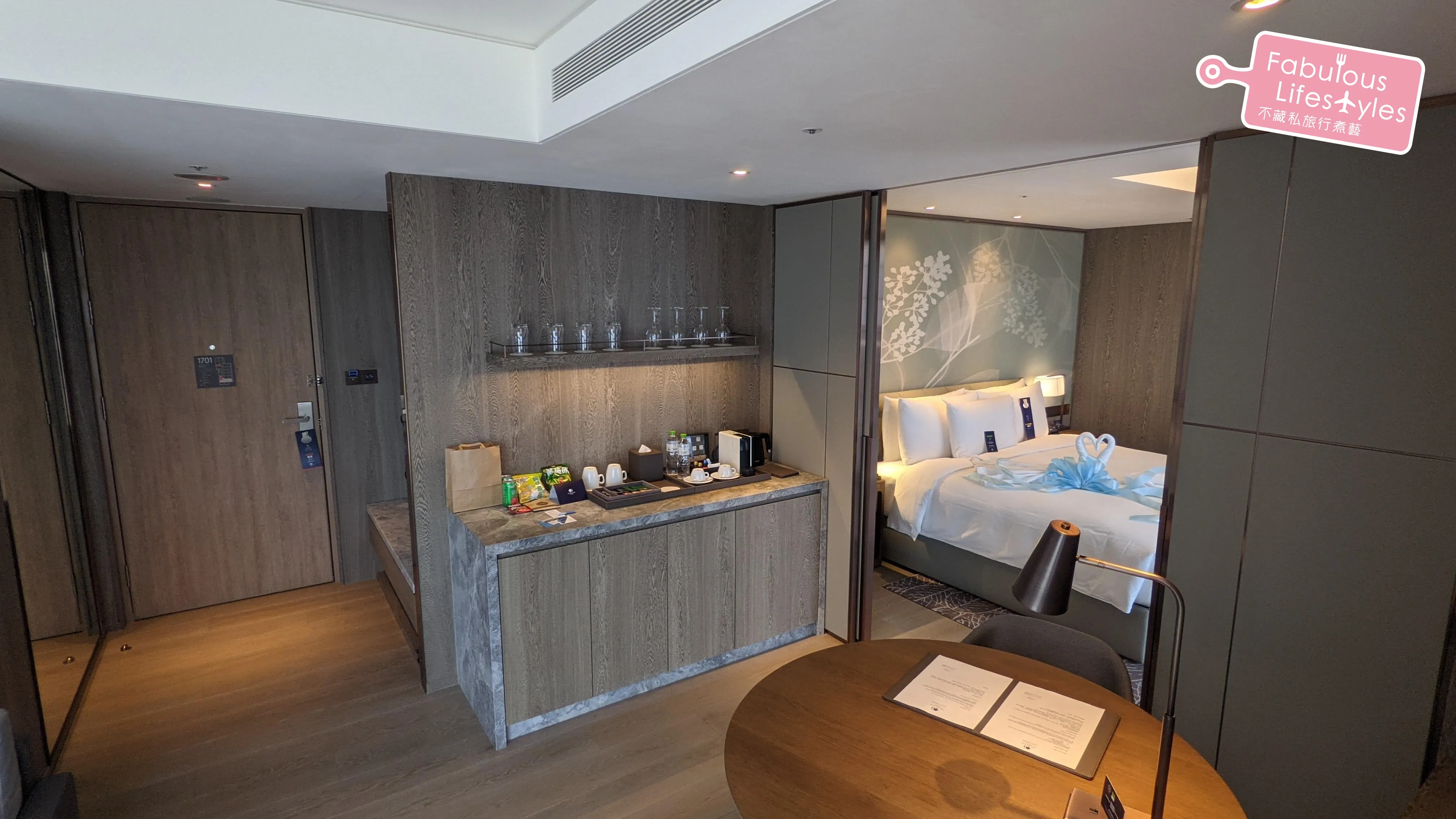 Living room combined with study desk and mini-bar