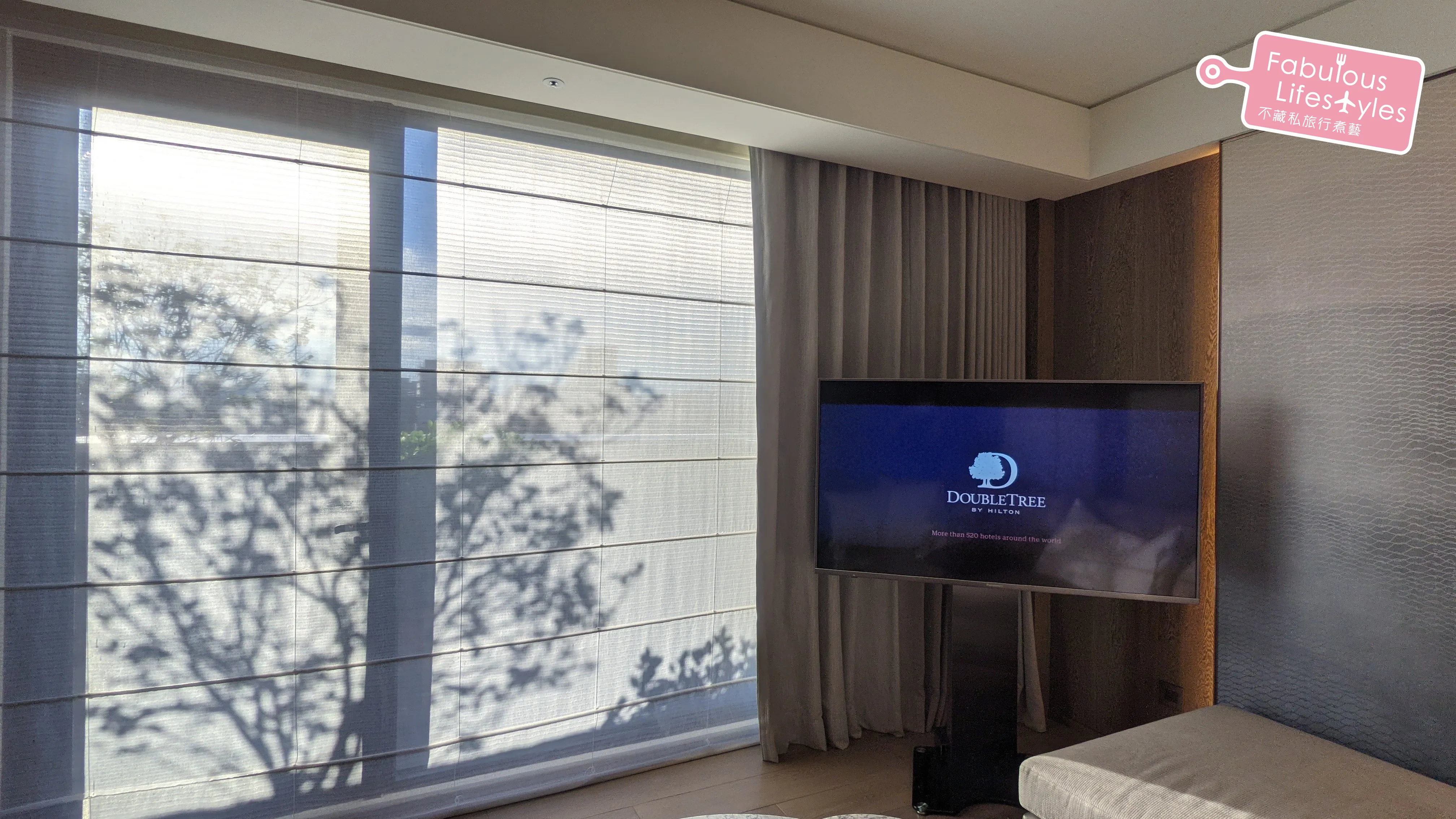 Tree shadows on the living room sheer curtains