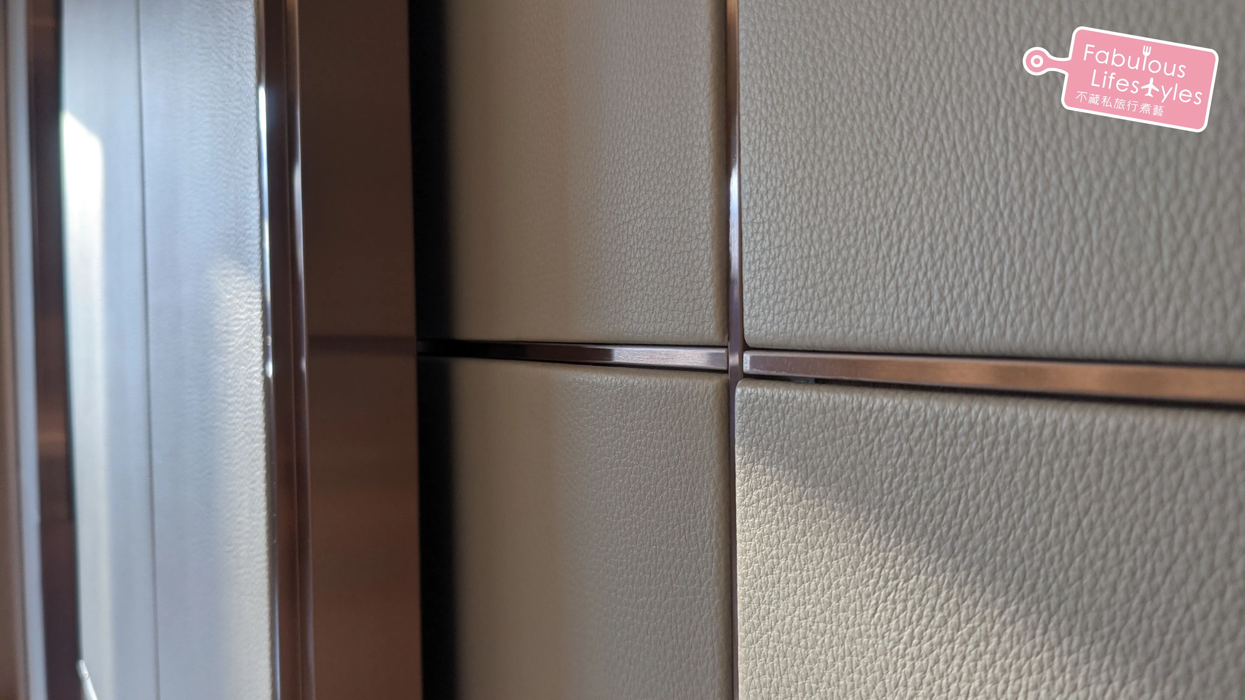 The light-colored leather is perfectly maintained