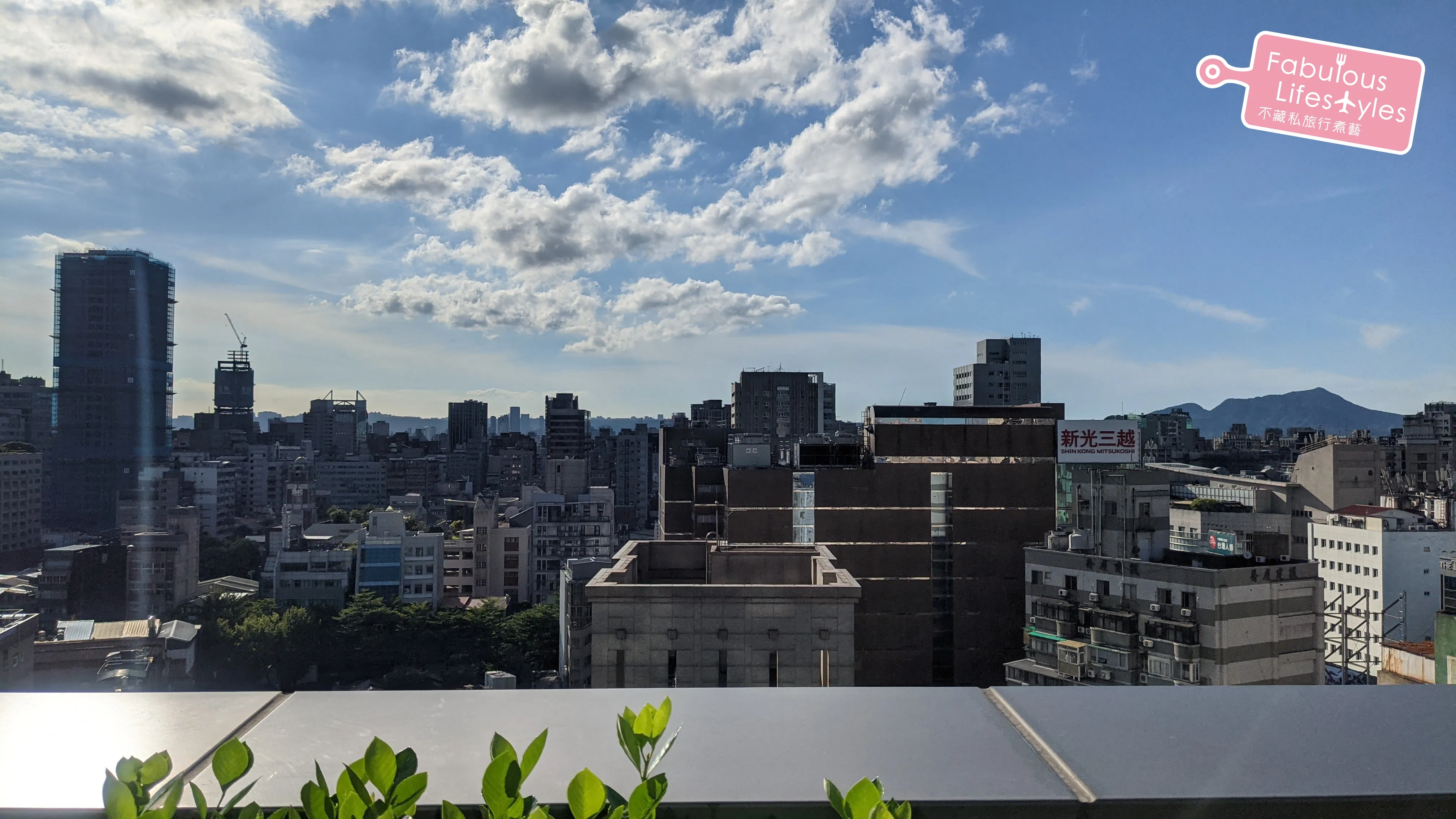 Looking out at the Taipei cityscape from the terrace